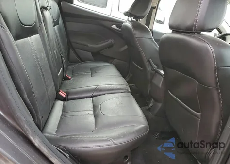 2014 Ford Focus Titanium z USA, uszkodzony, nr VIN 1FADP3J2XEL357647